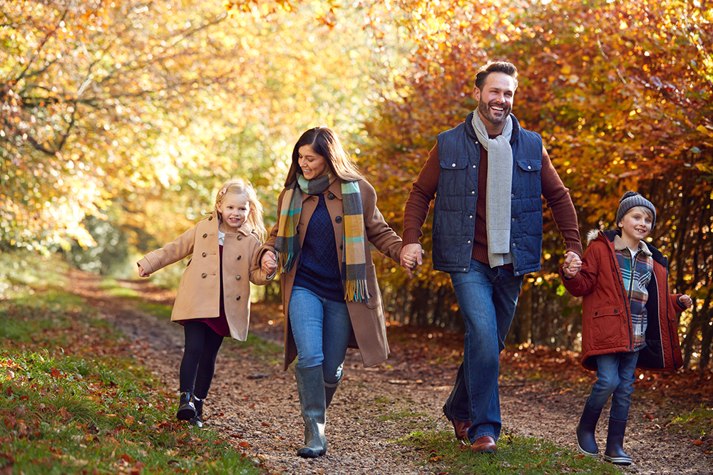 Family walking together in autumn