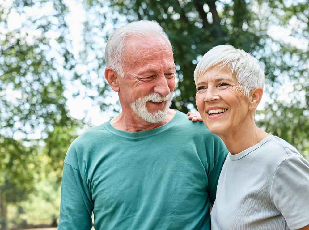 Smiling older couple outdoors